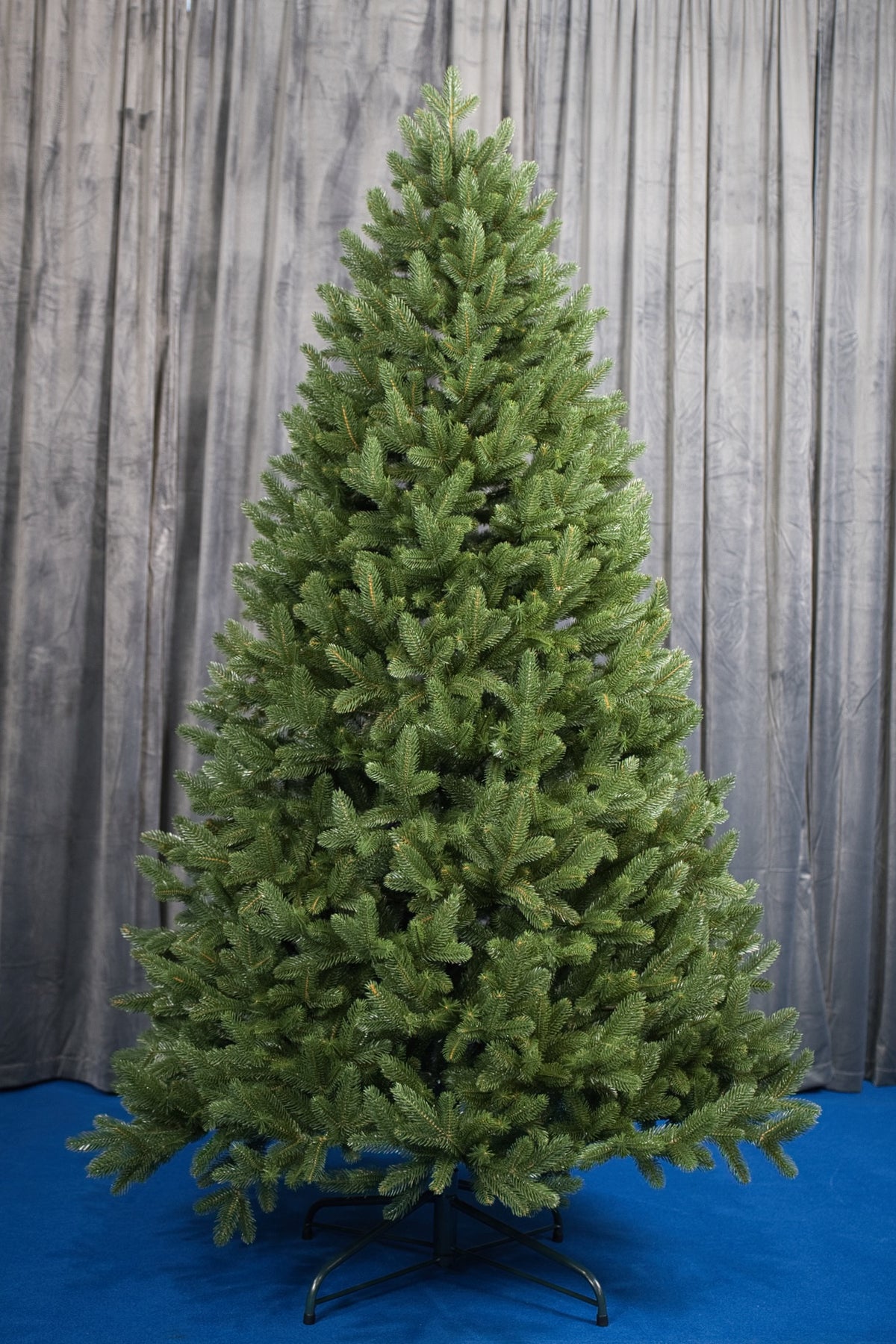 Ukrainian molded Christmas tree standing fully assembled and undecorated